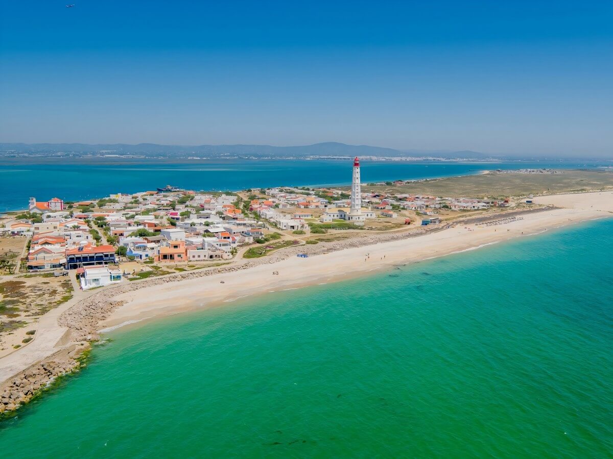Immerse yourself in the sun and sand of Faro Beach, the perfect vacation spot!