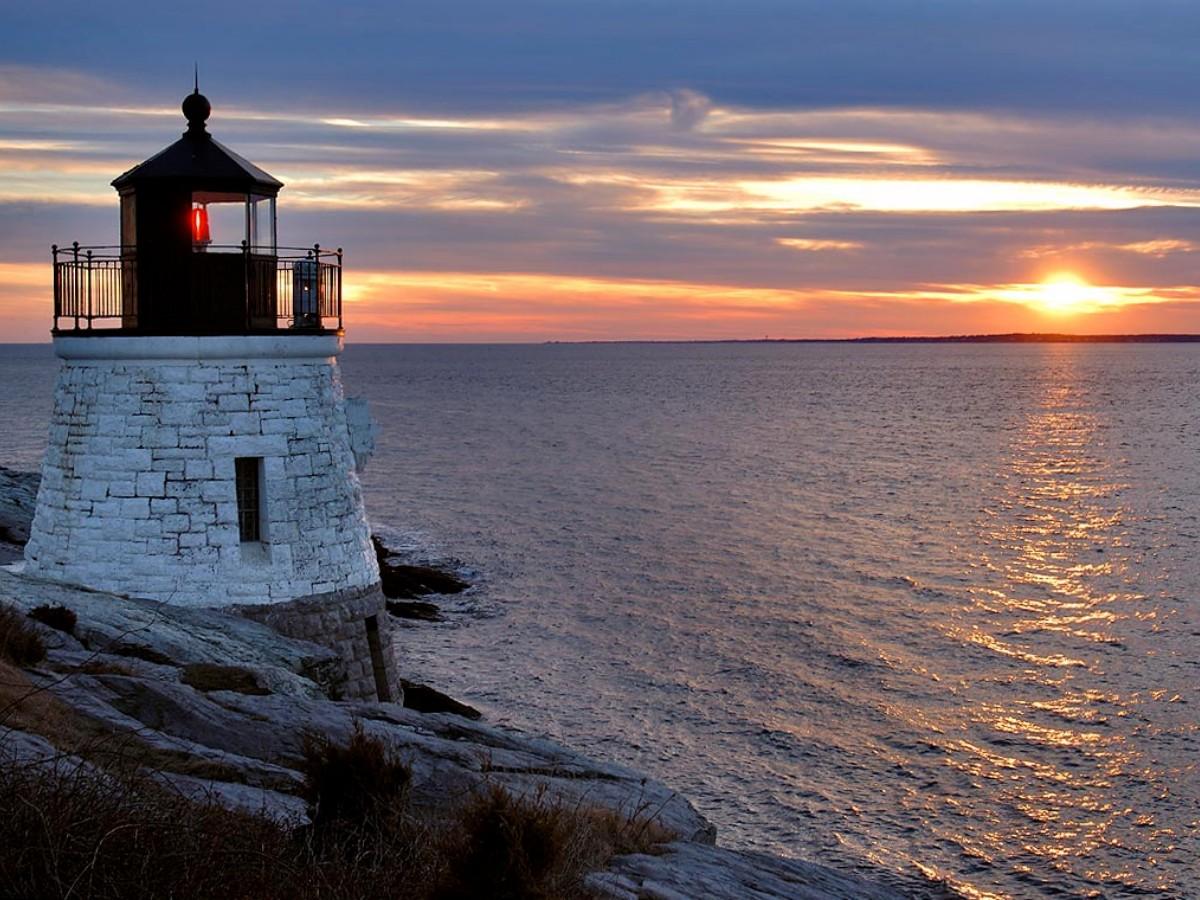 Sunset Viewing: Lighthouse and Ocean in the Afterglow