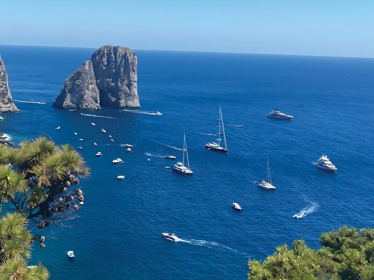 Take a boat trip around the island and enjoy the beauty of the coastline