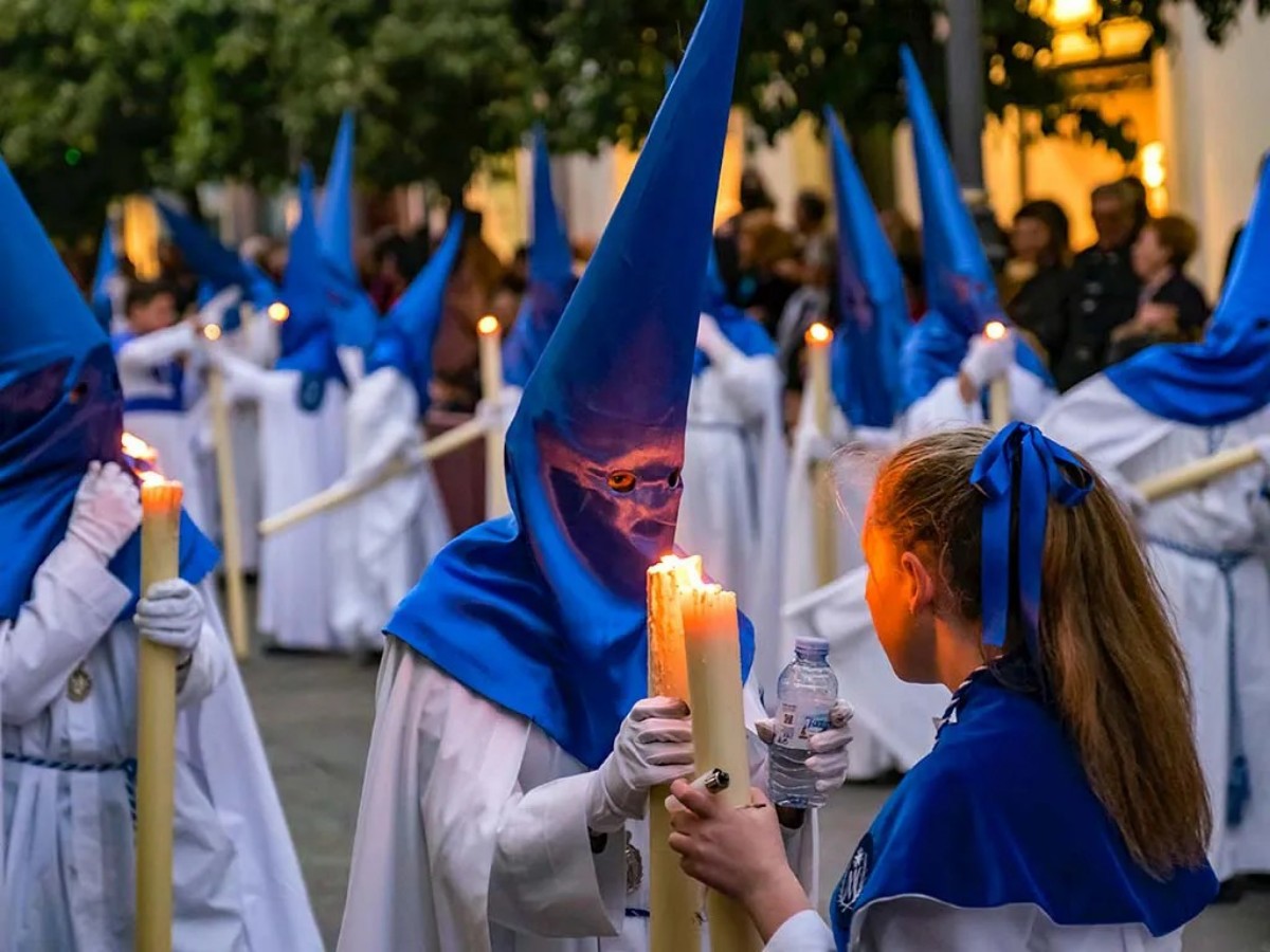 A sea of candlelight at night