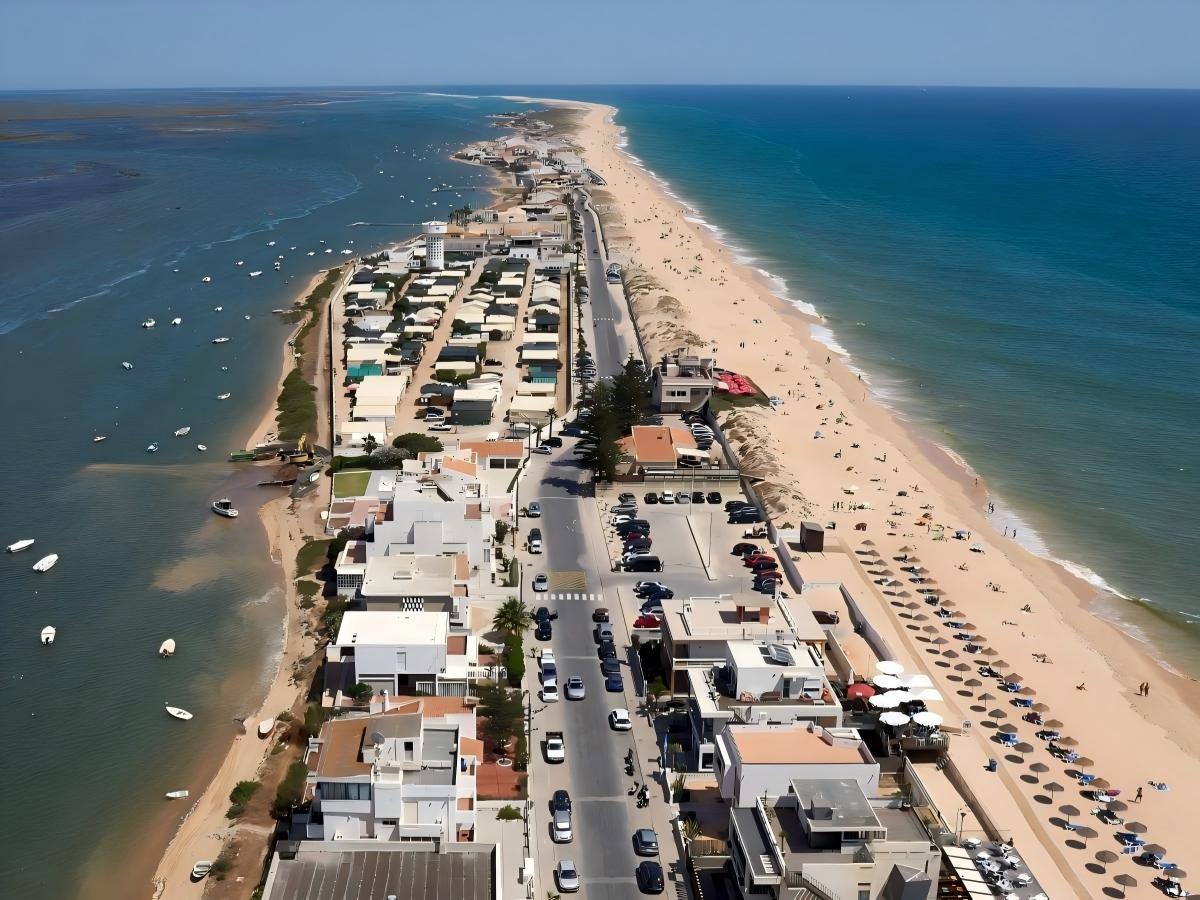 Arrival at Faro Beach